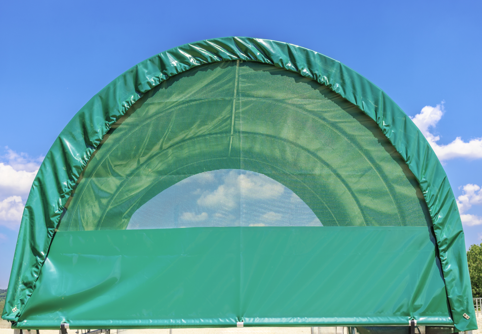Gable-end windbreak tarp for pasture tent